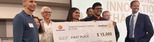 Students presented check at Sunstone Innovation Challenge.